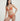 Woman wearing an orange bikini against a plain background