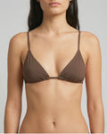 Brown bra worn by a model on a plain background