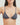 Woman wearing a dark gray triangle bikini top against a plain background