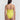 Yellow swimsuit worn by a person on a white background