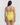 Yellow swimsuit worn by a person on a white background