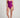 Woman wearing a purple one-piece swimsuit on a plain background
