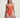 Woman wearing an orange swimsuit against a plain background