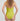 Person wearing a green swimsuit on a plain background