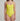 Woman wearing a yellow swimsuit against a plain background