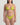 Woman wearing a green bikini against a plain background