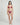Woman wearing a purple bikini on a white background