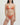 Woman wearing an orange bikini against a plain background
