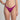 Person wearing a bright pink bikini bottom on a plain background
