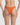 Orange bikini bottom worn by a person on a plain background