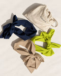 Three Masarà Pirate Headbands in Blueberry Blue, Pistachio Green and Cappuccino Beige