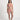 Woman wearing a pink bikini on a white background