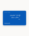 A blue Masara e-gift card with white text reading 'E-GIFT CARD', 'Collected slowly. Worn often.
