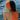 woman wearing orange headband by the sea
