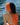 woman wearing orange headband by the sea