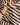 Brown and beige striped fabric with 'Mesarà' branding on a textured surface