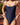 Navy blue swimsuit worn by a person with a blurred outdoor background