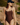 Woman wearing a brown swimsuit and navy cap outdoors