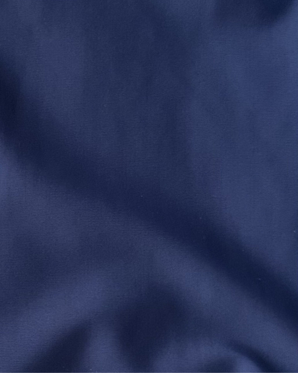 Close-up of blue regenerated nylon fabric texture