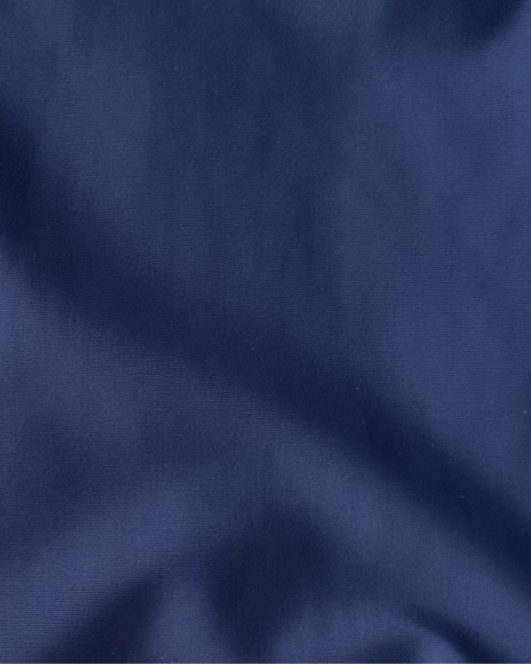 Close-up of blue regenerated nylon fabric texture