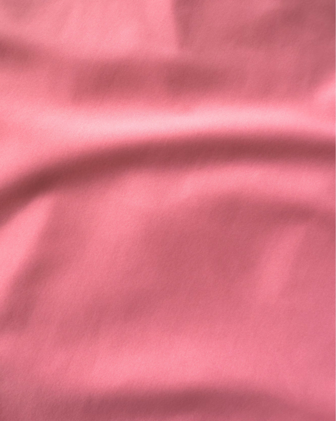 Close-up of pink regenerated nylon  fabric with visible texture
