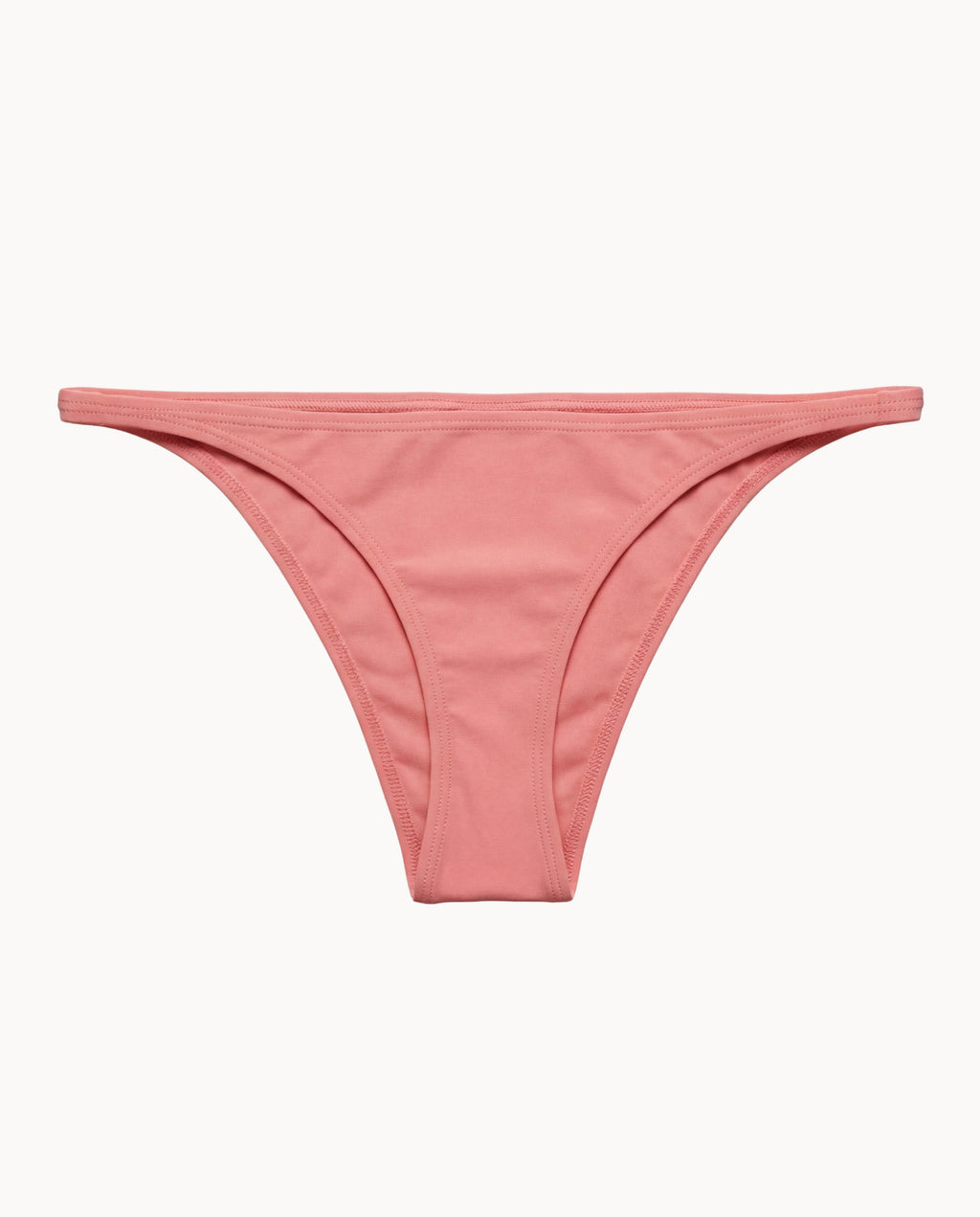 Pink thong bikini bottom on a white background