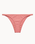 Pink thong bikini bottom on a white background