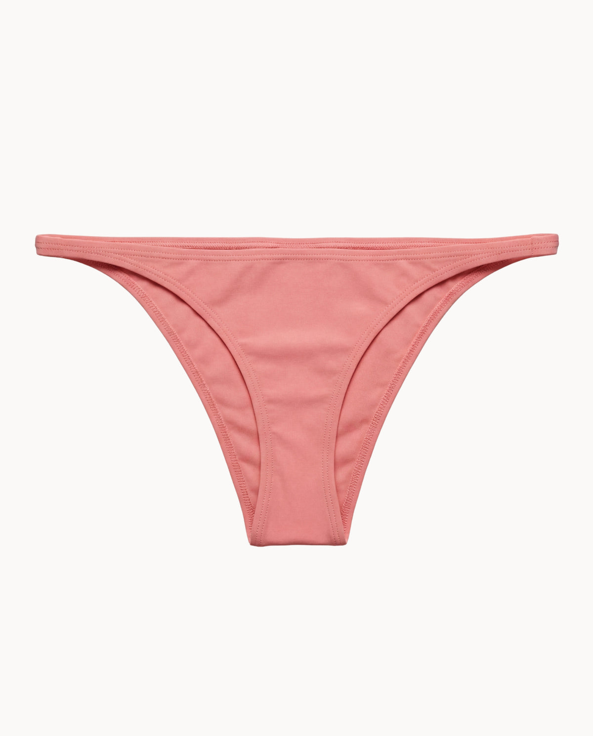 Pink thong bikini bottom on a white background