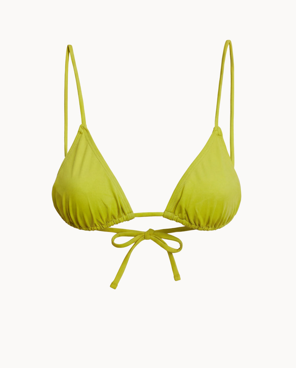 Yellow bikini top with thin straps on a white background